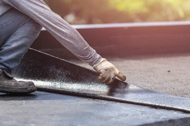 Professional Basement Waterproofing technician working in Sweetser, IN